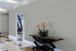 Fotografía: Paredes con revestimiento vinílico lavable y resistente a los roces.