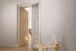 Fotografía: Revestimiento vinílico lavable en paredes de distribuidor. Limpio,rápido y resistente.